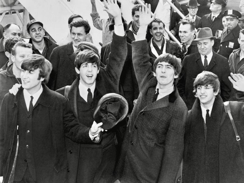 The Beatles – John Lennon, Paul McCartney, George Harrison and Ringo Starr – wave to their fans after arriving at Kennedy Airport in February 1964. Five years later, on Dec. 30, 1969, they would perform their final live concert, in conjunction with their “Let It Be” album, on a rooftop in London. PUBLIC DOMAIN PHOTO/WIKIPEDIA